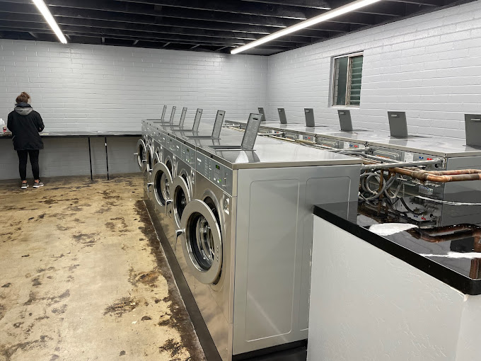 Rows of new self-service washers at PC's Wash & Go Burley laundromat
